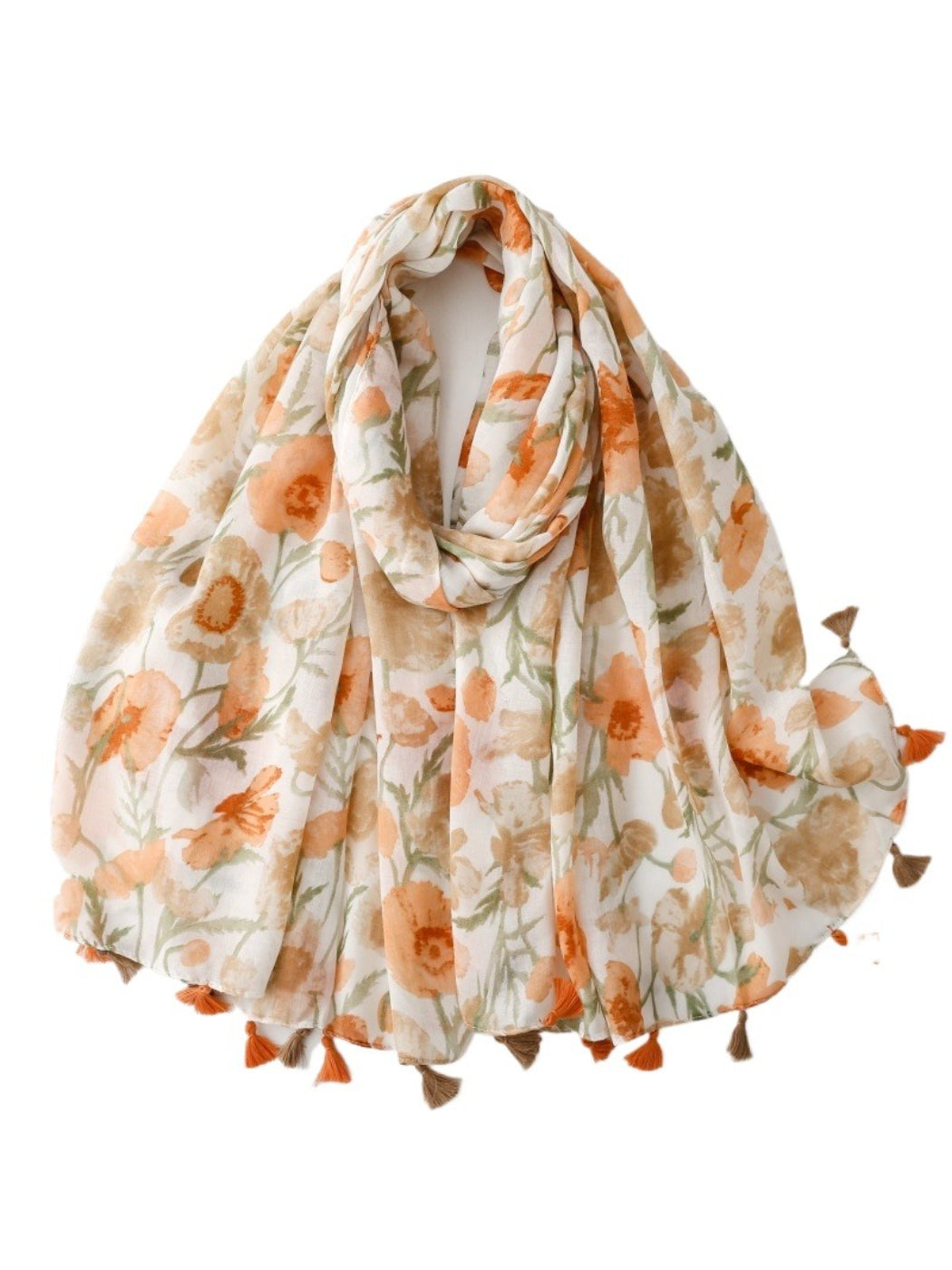 Close-up of Scarvii scarf fabric with detailed watercolor floral design and tassel trim