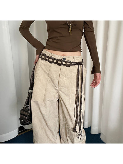 Beco Boho woven ring tie waist belt tied in a bow on a mannequin