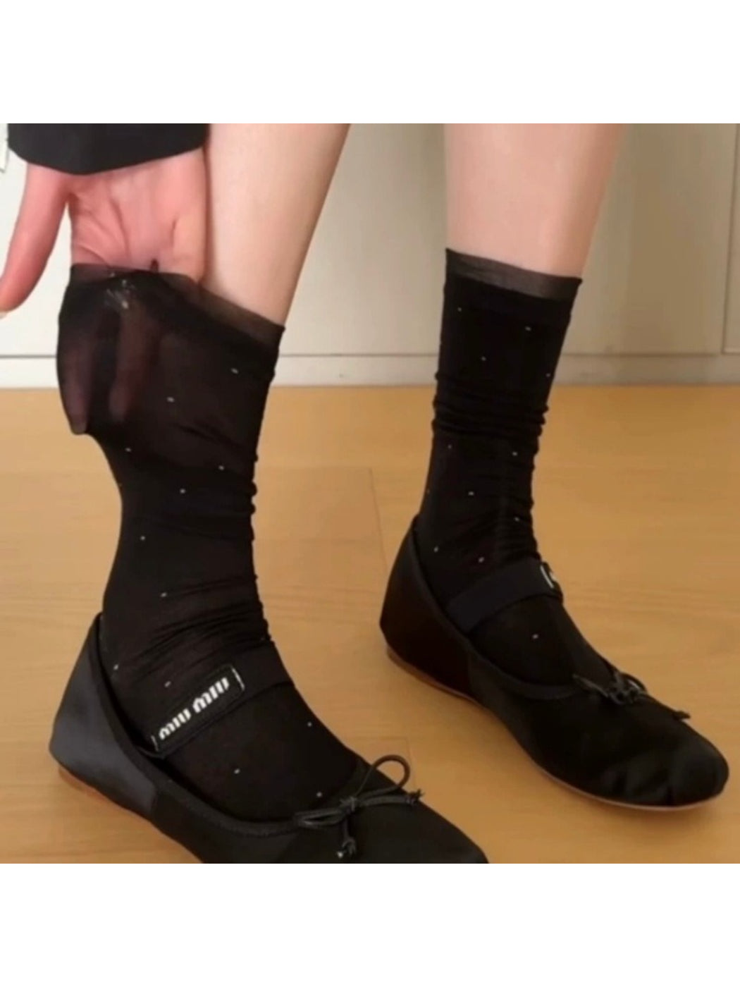 Close-up of Rufia soft polka dot mesh socks showing sheer fabric and polka pattern