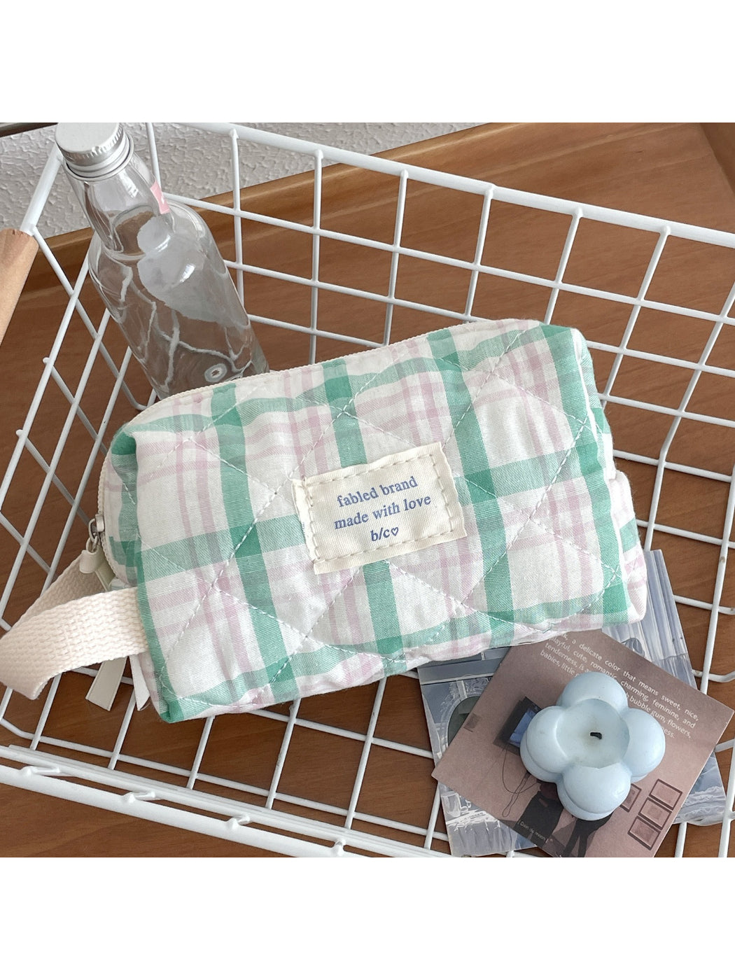 Close-up of Cosbai pastel check pattern on travel makeup bag fabric