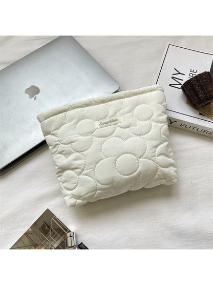 Side view of Cosbai Quilted Daisy Cosmetic Pouch highlighting thickness and quilting