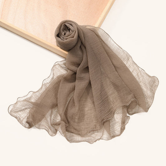Scarvii wavy edge textured shawl scarf folded on a white background