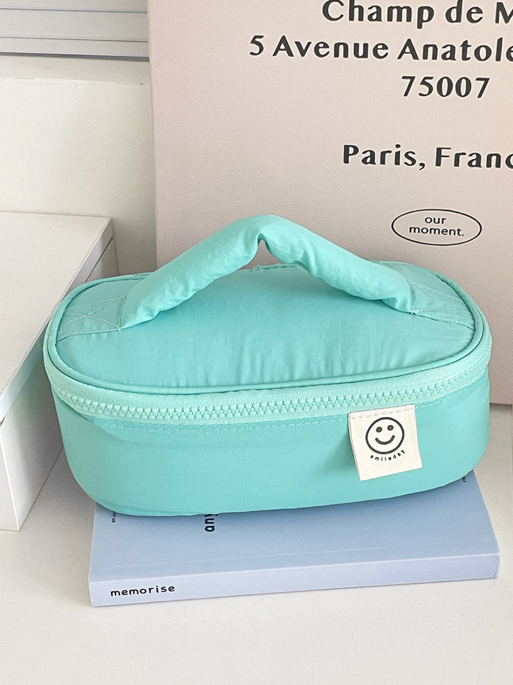 Cosbai Smiley Patch Cosmetic Bag displayed on flat surface with smiley patch front
