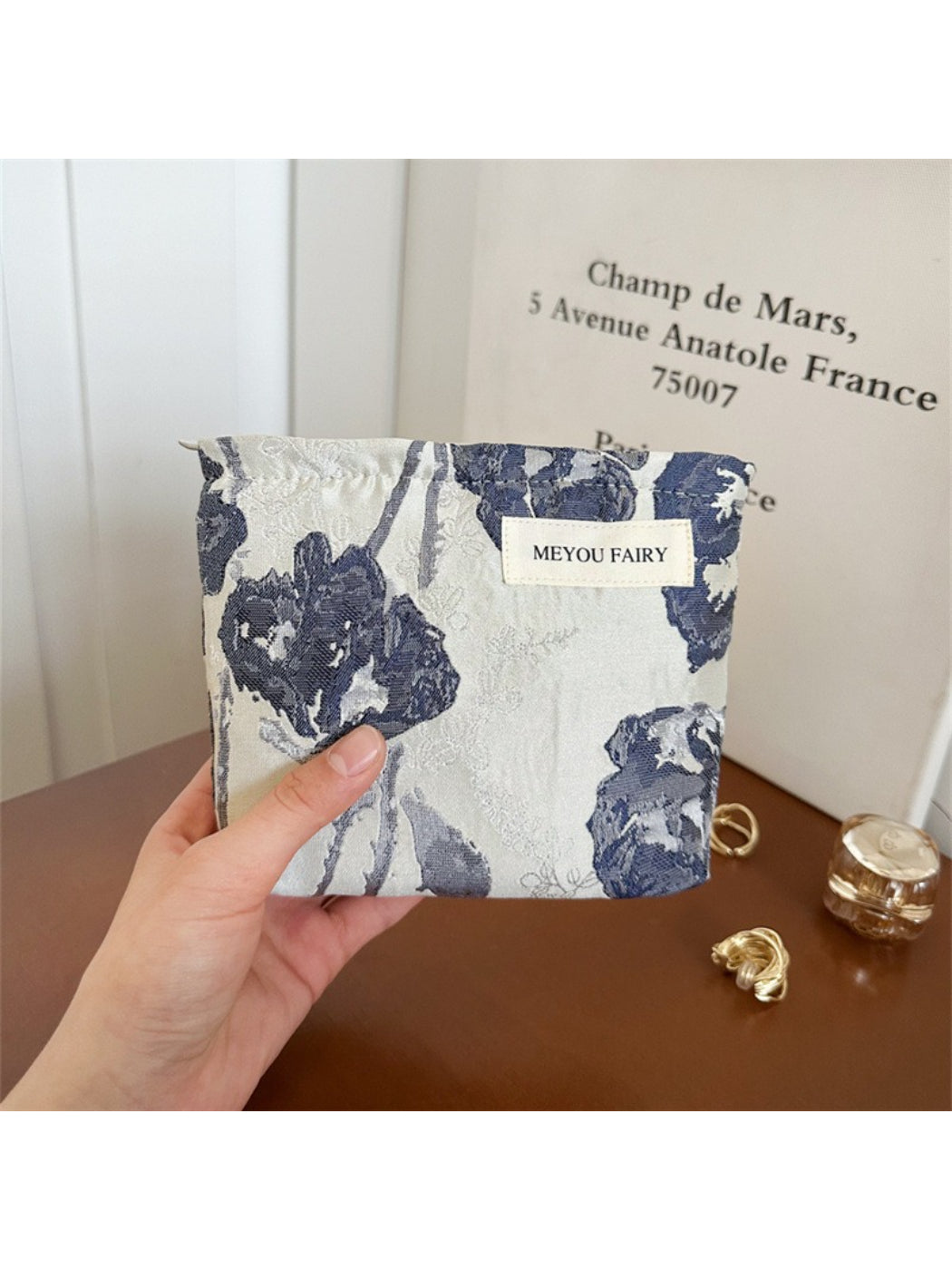 Top view of Cosbai Artistic Bloom Pattern Cosmetic Bag showing pull