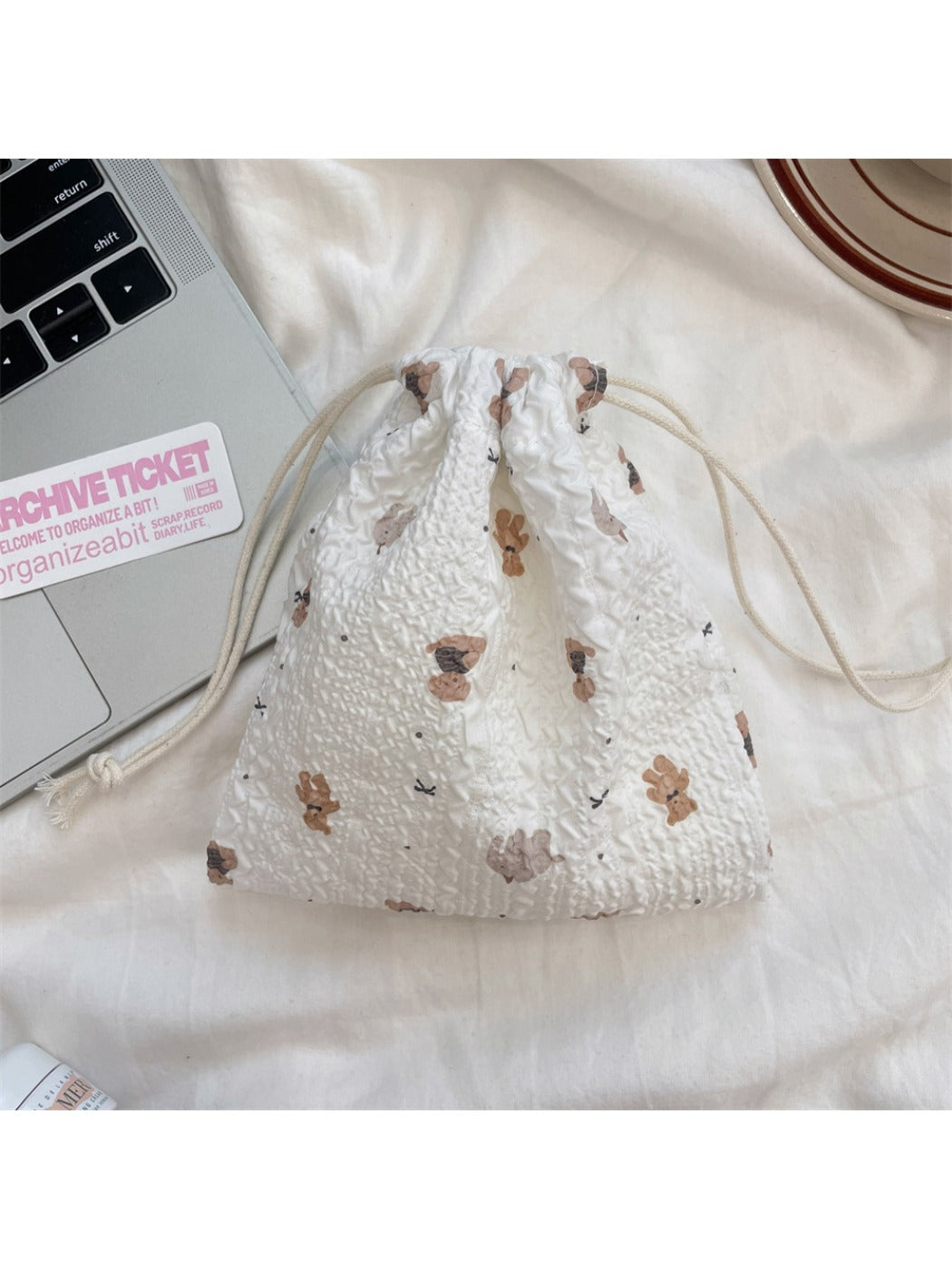 Cosbai cartoon drawstring pouch featuring a mix of colorful cartoon illustrations