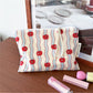 Cosbai floral cartoon cosmetic bag displayed standing upright with visible floral and cartoon print