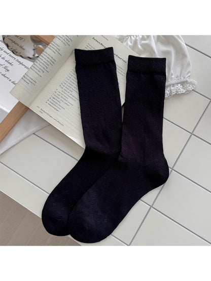 Rufia soft pointelle socks in beige paired with casual shoes