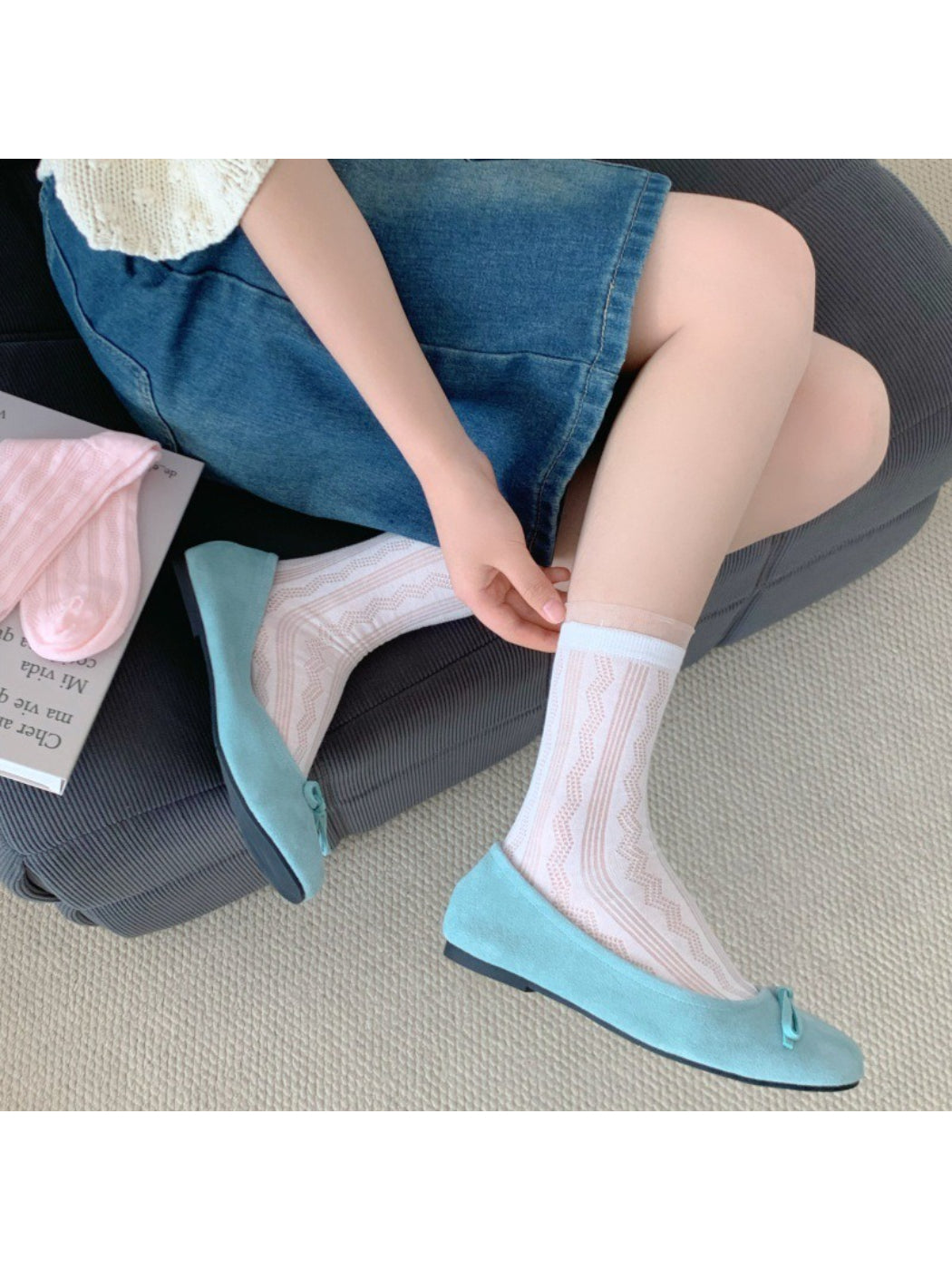 Pair of Rufia sheer wave pattern crew socks in light beige and white