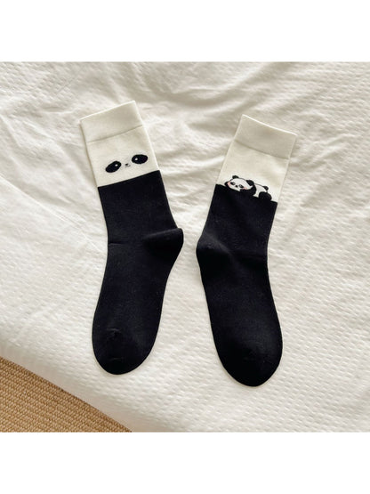 Rufia soft crew socks laid flat highlighting the full bear motif and cream color