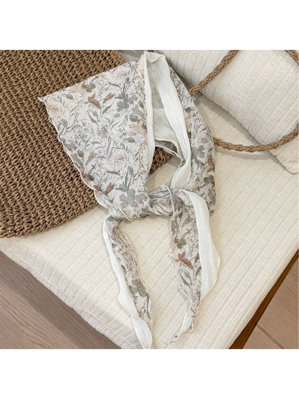 Close-up of botanical print on lightweight triangle scarf