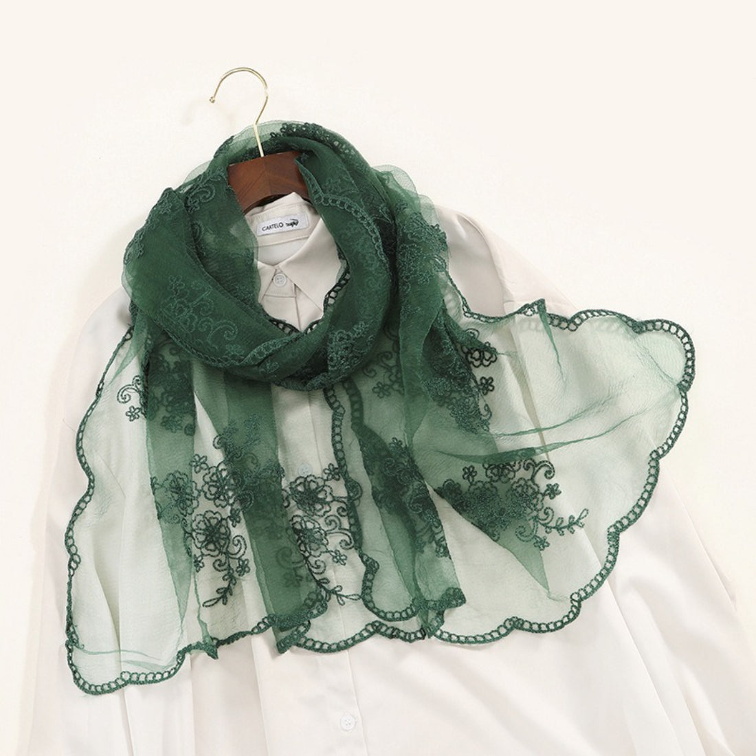 Scarvii scarf with ornate baroque embroidery displayed flat on white background