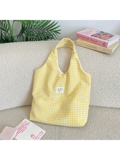 Cosbai tote bag with check pattern hanging from a hook against a white wall
