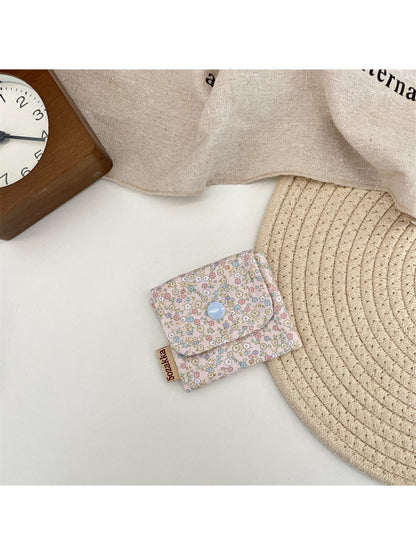 Cosbai Floral Print Coin Pouch shown from side with floral fabric visible