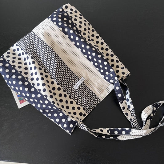 Side view of Cosbai Graphic Polka Dot Shopper Tote showing spacious interior and handles