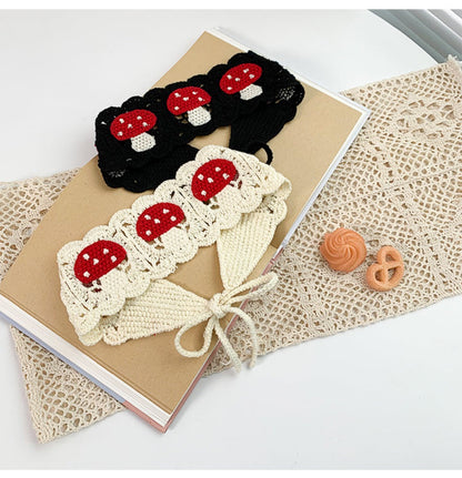 Top view of Haila crochet mushroom hairband showing intricate crochet pattern
