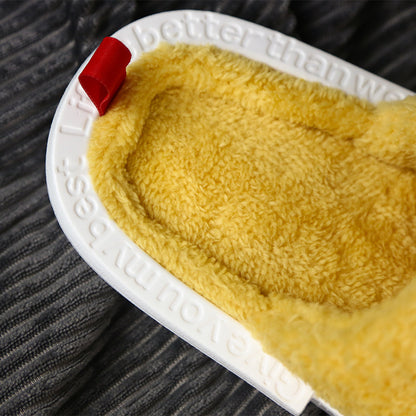 Slipeer slippers displayed on plain background