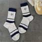 Rufia soft socks with heart pattern styled with rolled-up jeans