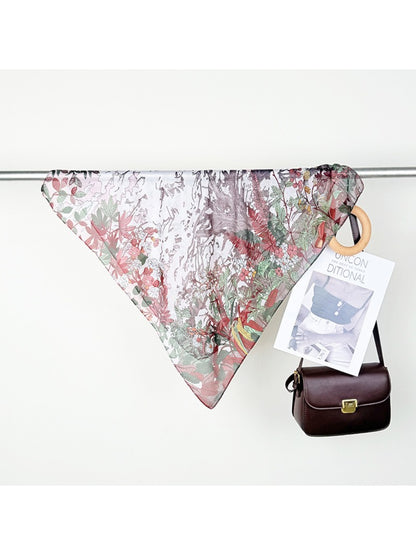 Scarvii Botanical Scene Square Scarf draped over shoulder showing soft fabric and botanical details