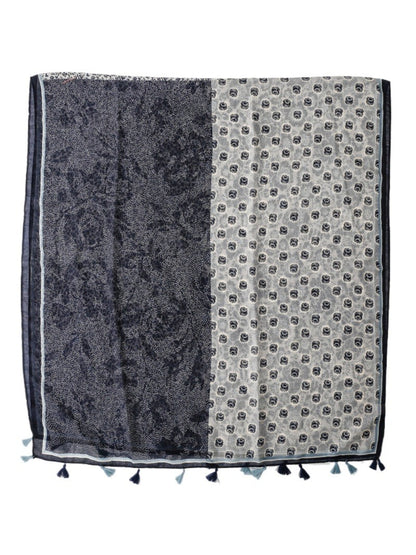 Close-up of the Scarvii scarf showing detailed patchwork patterns and fabric texture