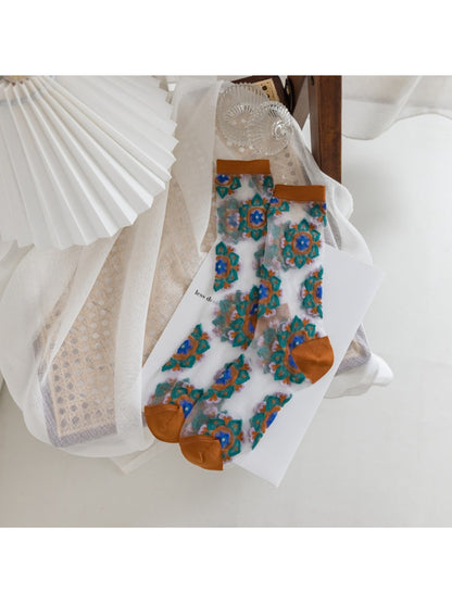 Rufia sheer blossom pattern crew socks folded to show pattern and texture