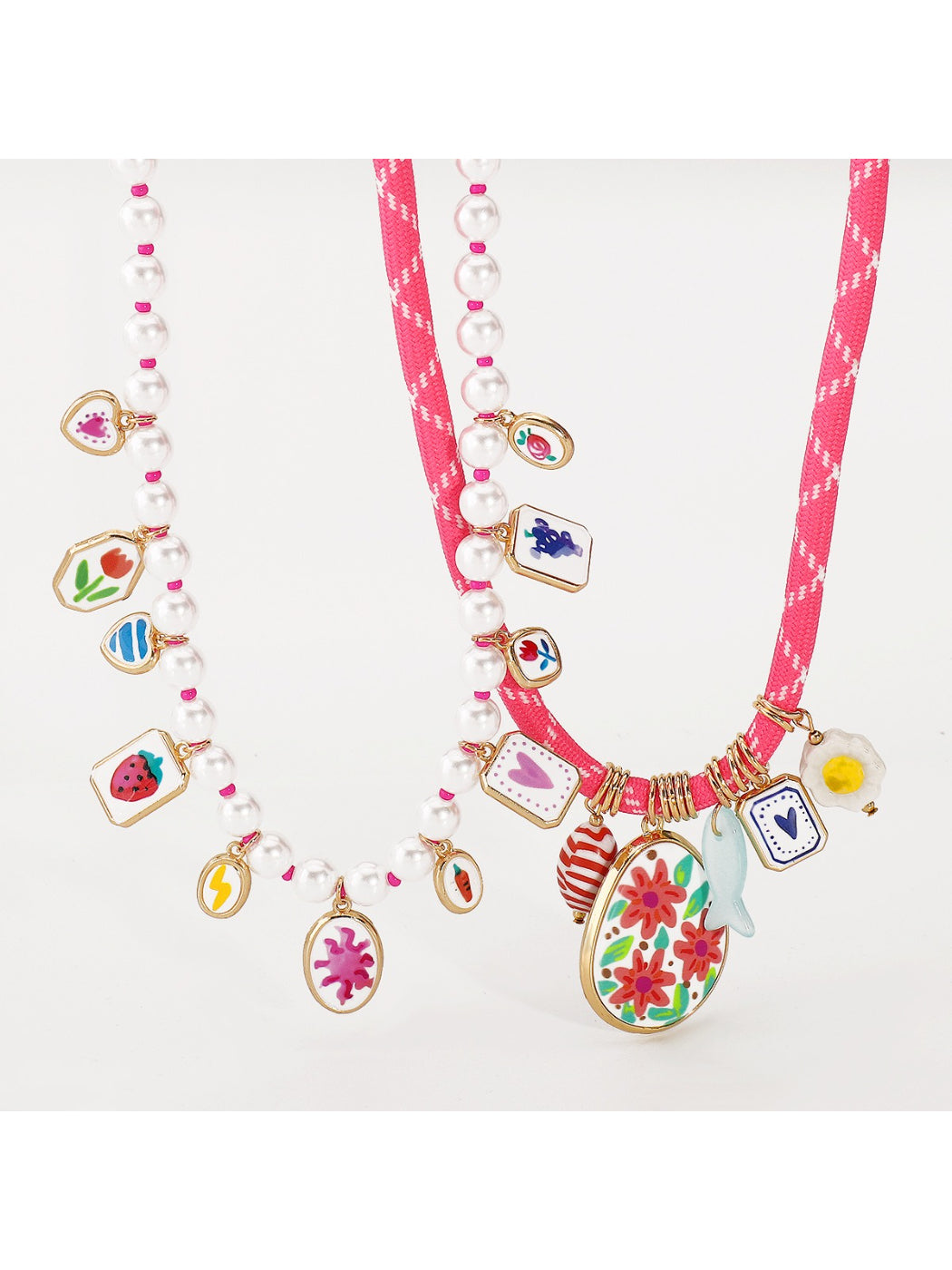 Neckit Mixed Charm Beaded Necklace arranged in a circular shape on a flat surface