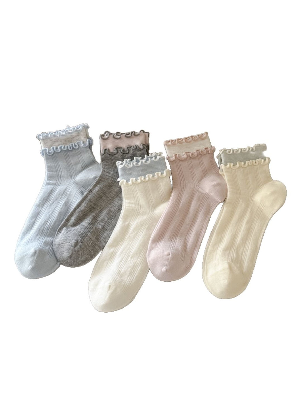 Pair of Rufia Sweet Frill Edge Ribbed Socks in soft pink color displayed flat