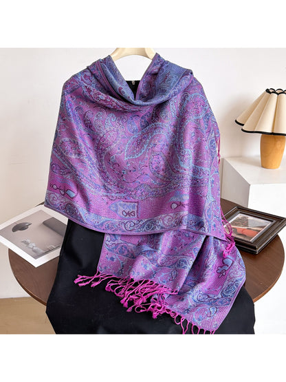 Close-up of colorful paisley pattern on bohemian fringe shawl