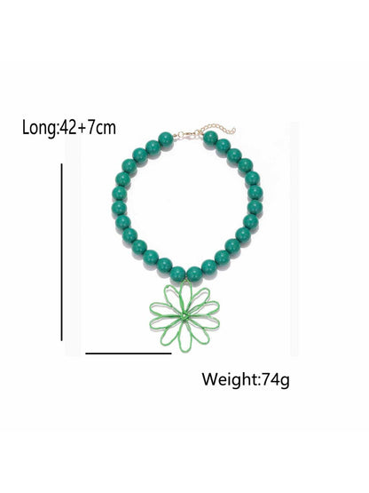 Neckit Statement Flower Pendant Beaded Necklace laid flat showing flower pendant detail