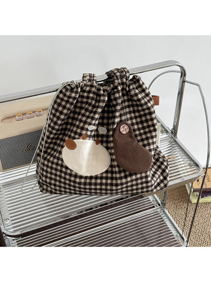 Cosbai Puppy Gingham Drawstring Tote folded flat for storage
