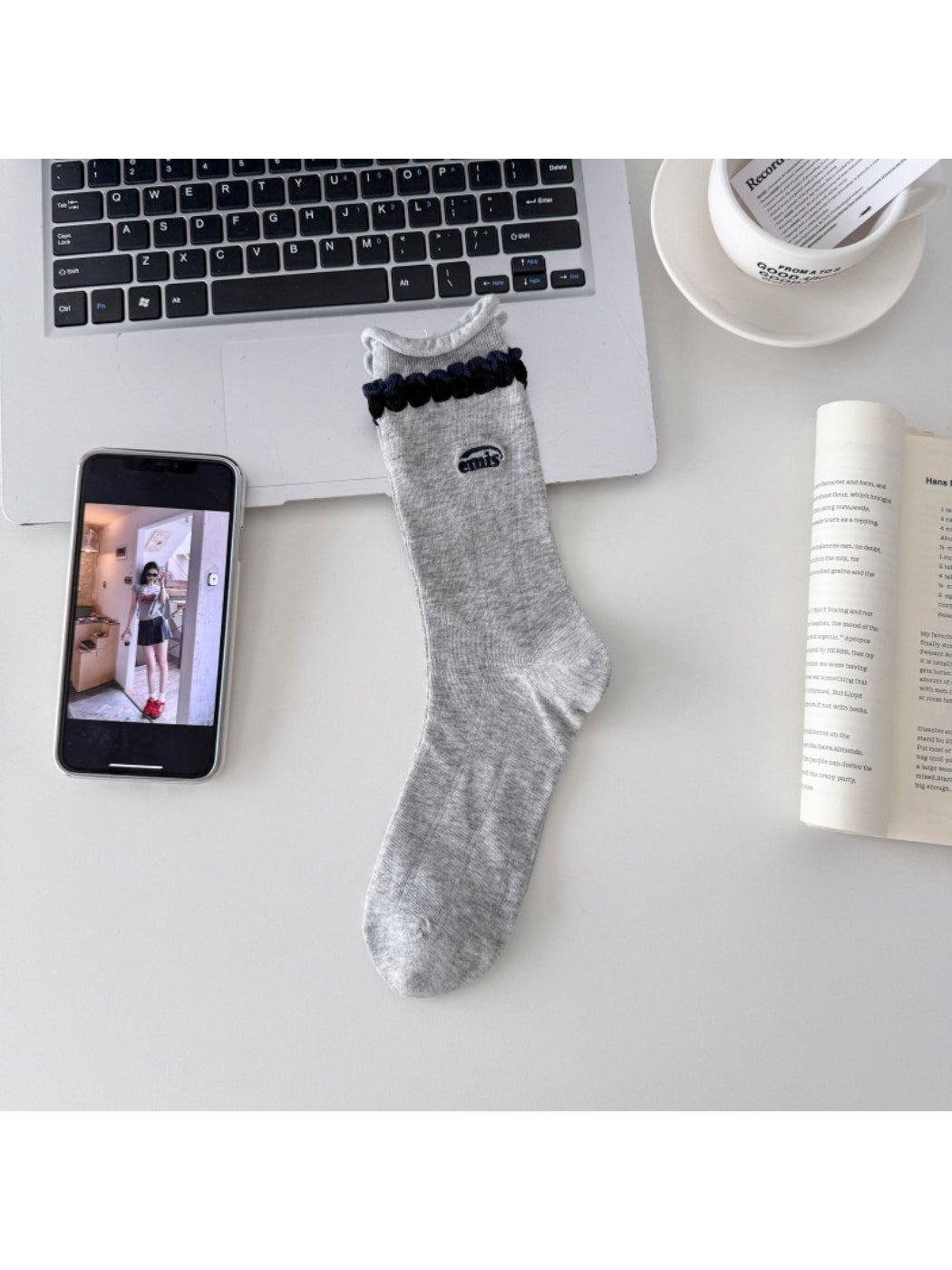 Rufia contrast braid knit socks folded neatly showing the knit detail and color contrast