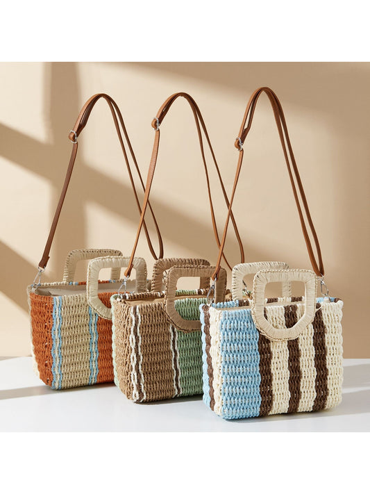 Cosbai colorblock straw crossbody bag with natural and black sections on white background