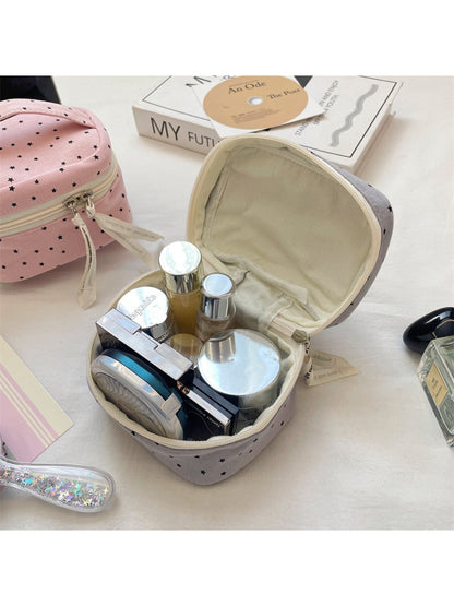 Cosbai mini star print cosmetic case placed on white surface, showing overall shape and