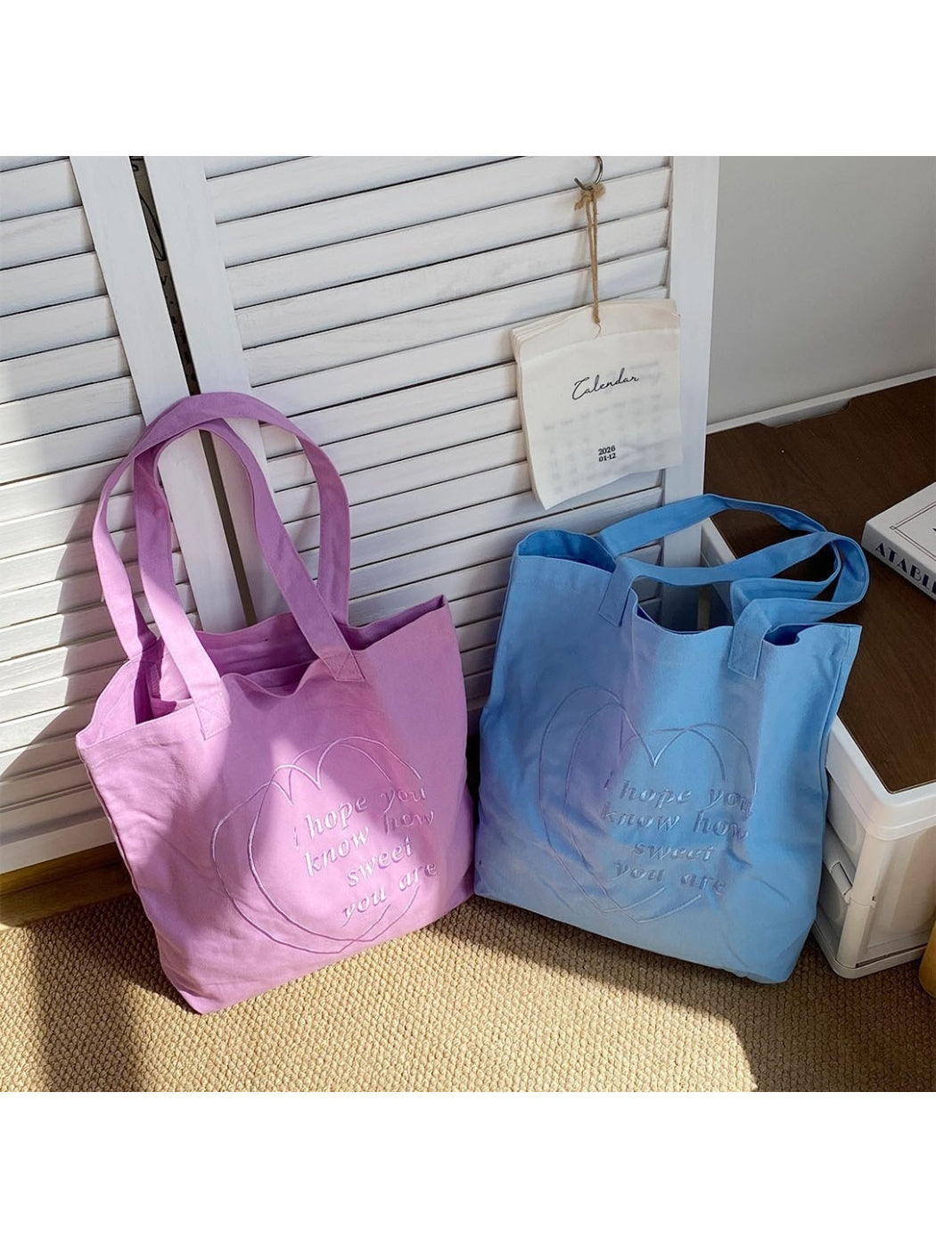 Cosbai Simple Stitch Detail Tote in beige with stitched accents, front view