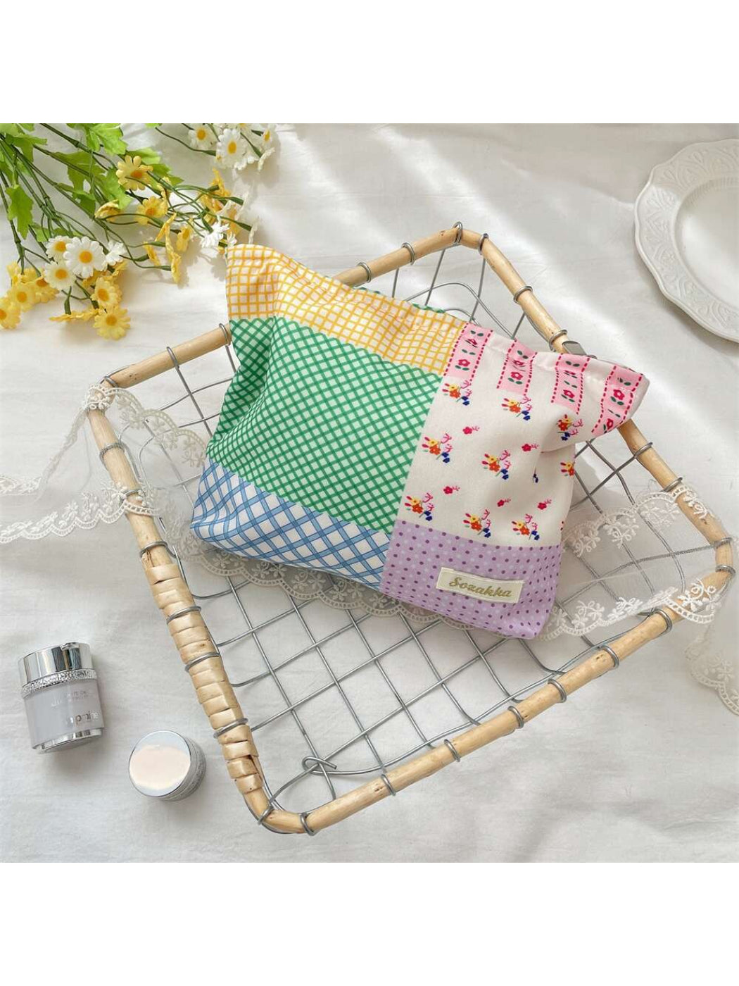 Close-up of patchwork check pattern on Cosbai cosmetic pouch fabric
