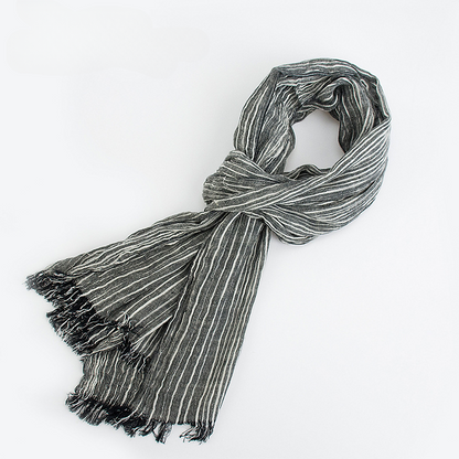Scarvii scarf rolled up highlighting soft fabric and stripes