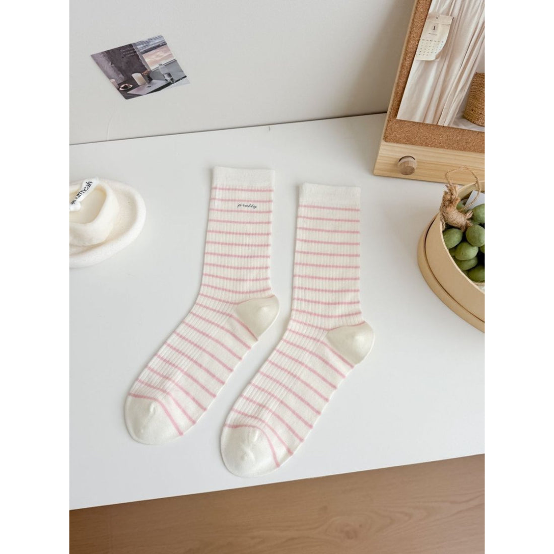 Rufia Pretty Fine Stripe Crew Socks in packaging with brand label visible
