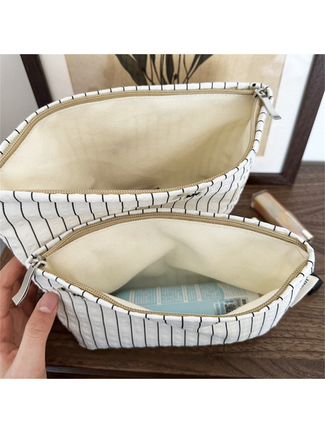 Cosbai Classic Pinstripe Cosmetic Organizer with trays and organized makeup brushes