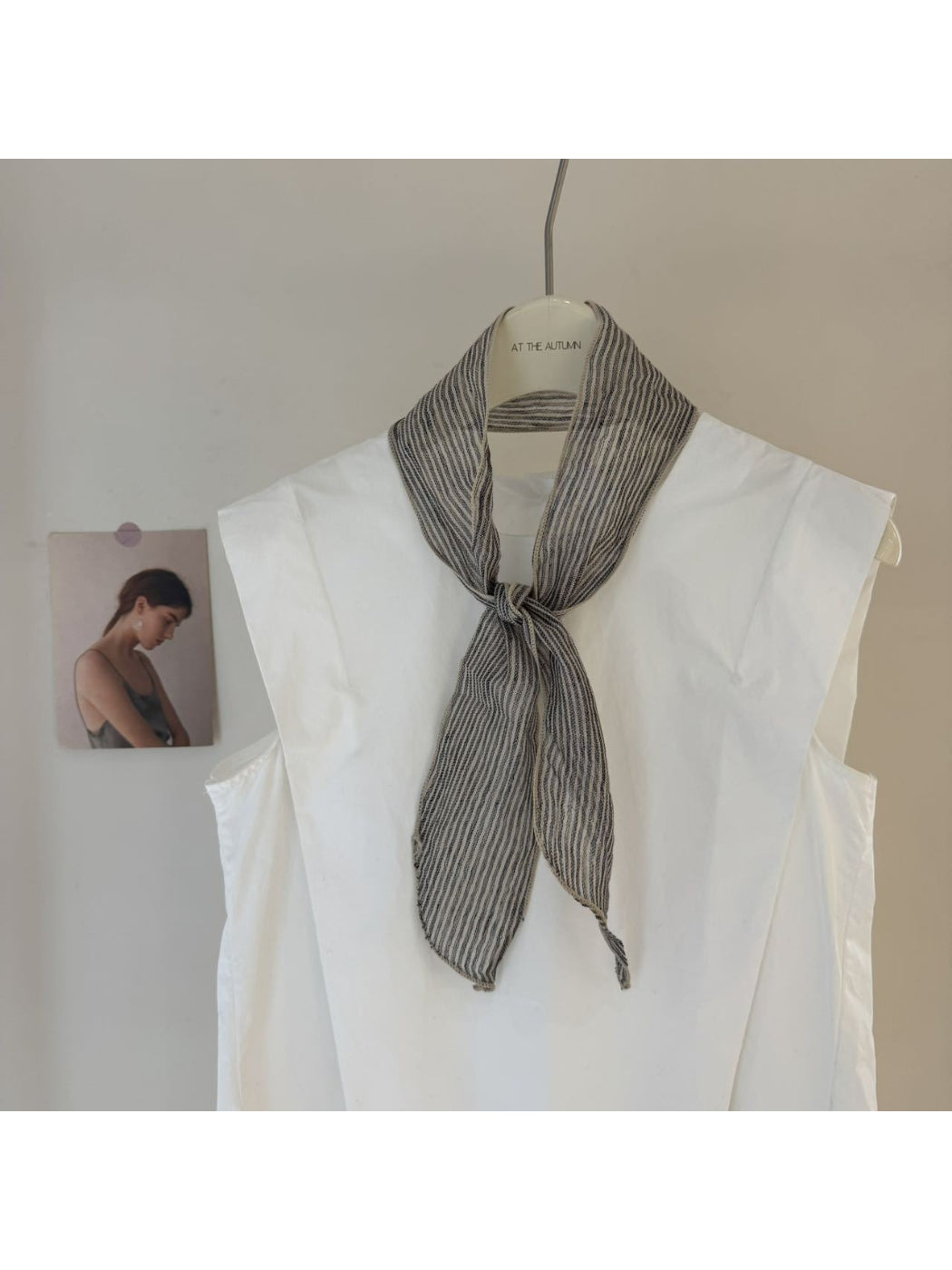 Scarvii skinny scarf folded with visible edges and gingham stripe pattern