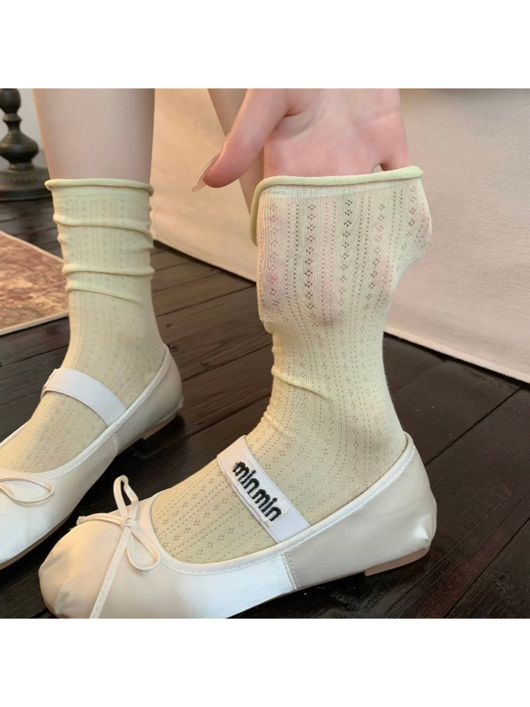 Rufia ribbed mid-calf socks in beige shown from top angle