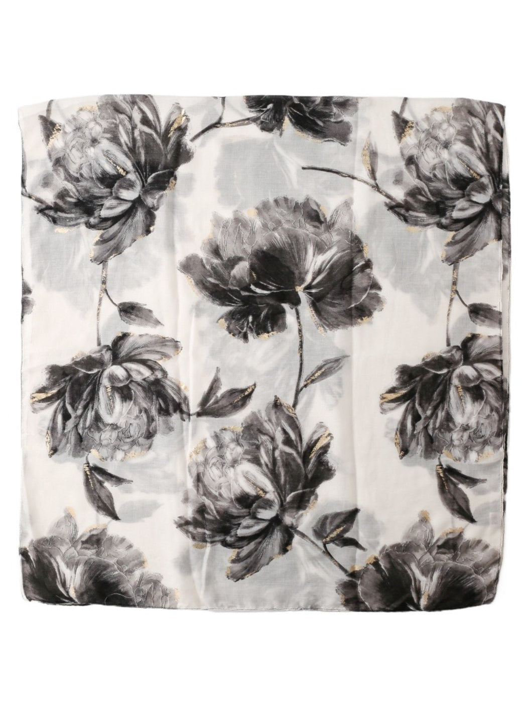 Scarvii scarf draped over a chair highlighting soft fabric and floral design