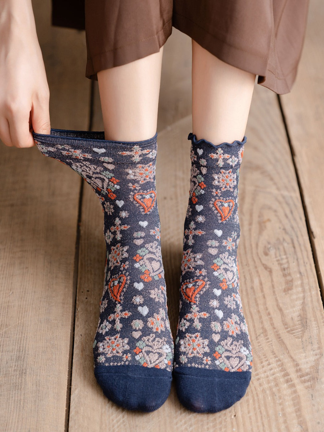 Rufia Heart White Mid-Calf Socks arranged to show both front and back views