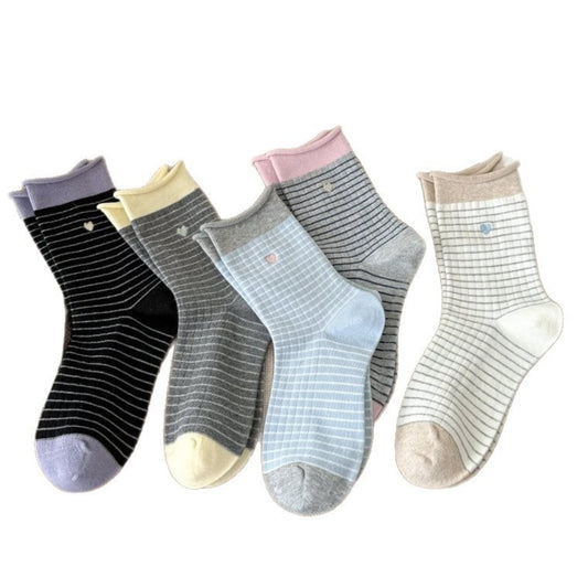 Pair of Rufia Everyday Stripe Heart Socks in white with red and pink stripes and heart pattern