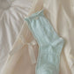 Rufia mesh dot mid-calf socks worn with shoes, showing sheer fabric and dot details