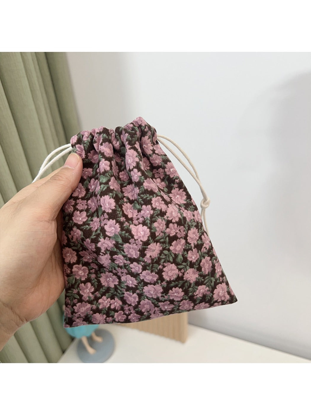 Close-up of Cosbai Floral Pouch showing detailed floral print