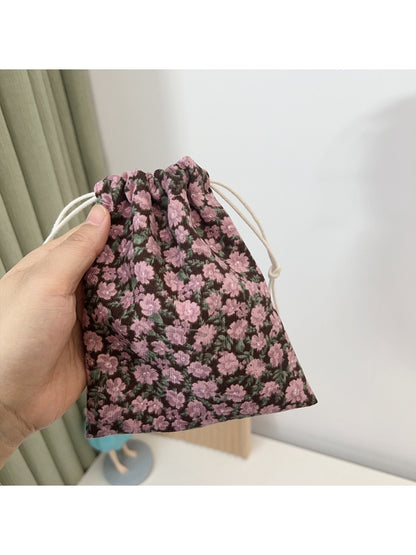 Close-up of Cosbai Floral Pouch showing detailed floral print