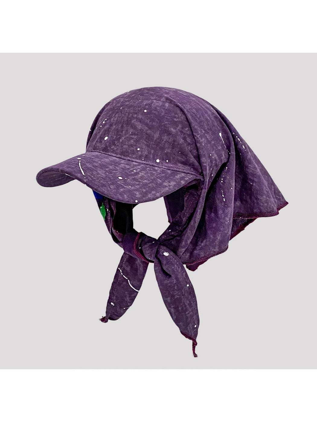 Close-up of Haila baseball cap featuring detailed graffiti vintage print