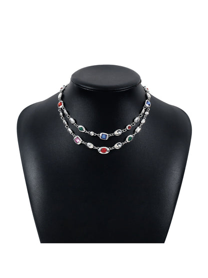 Neckit layered gem chain necklace displayed on a jewelry stand showing chain details