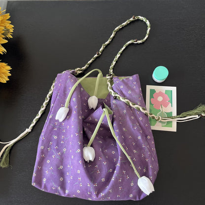 Side view of Cosbai Garden Floral Shoulder Bag highlighting the zipper and strap attachment
