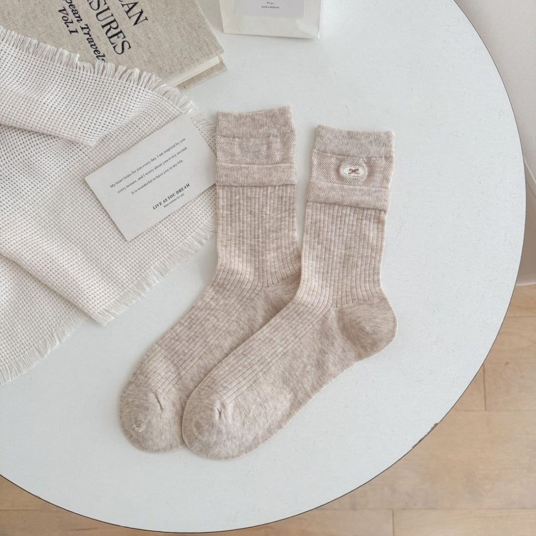 Pair of Rufia soft turnover cuff ribbed socks styled with outfit
