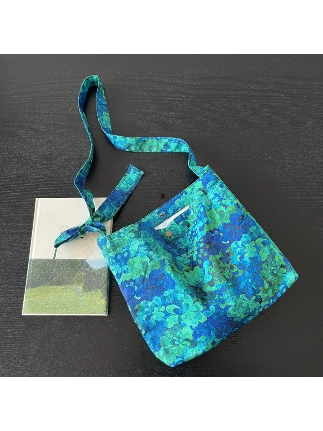 Cosbai blue floral tie shoulder bag open to reveal interior lining